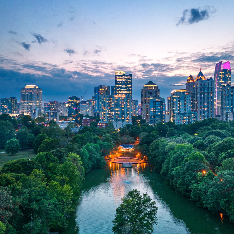 Atlanta, Georgia, USA overlooking Piedmont Park at dusk.