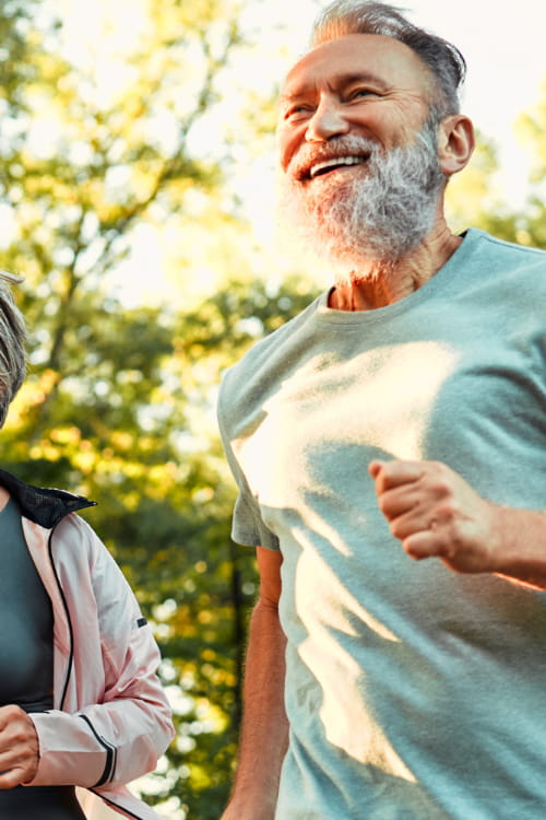 an elderly man running