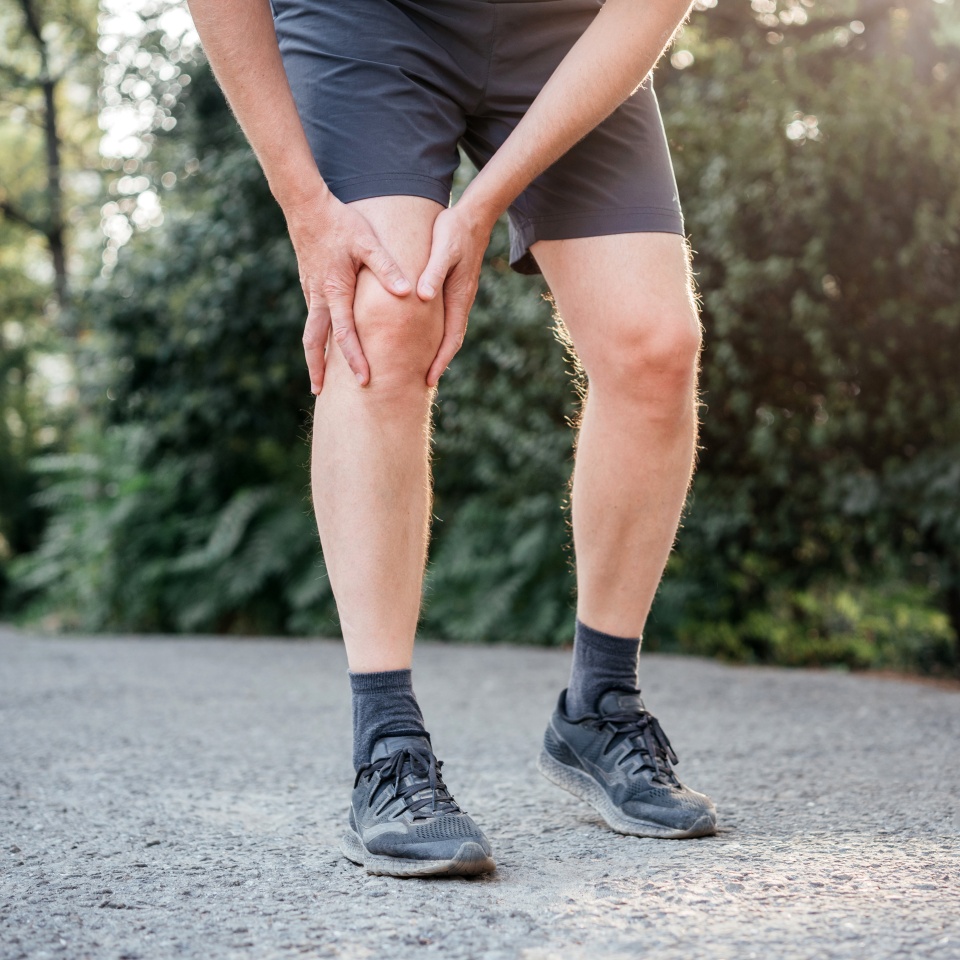A man having difficulty in straightening or bending the knee because of bursitis