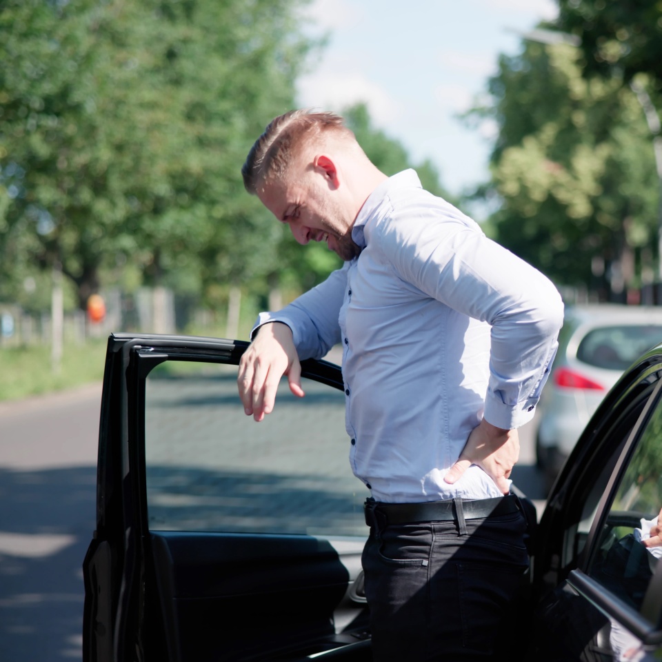 Driver Seeking Compensation For Back Injury Caused By Car Accident.